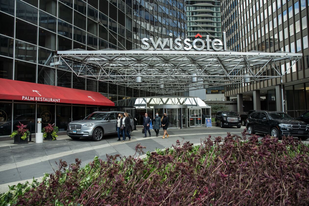 Terminated Swissotel employees Maria Teresa Hernandez, Maria Ruiz and Maria Lourdie Pierre-Jacques walk out of Swissotel, 323 E. Wacker Dr., with their attorney, Stephen Yokich, on Tuesday, Oct. 26, 2021 after delivering a copy of the lawsuit they filed against the hotel.